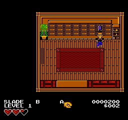 Slade holds the ignition coil over his head in the Mail Room, under the wall of mailboxes.